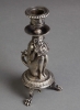 An unusual Silvered candle stick of an old man as fantasy figure, circa 1880