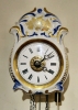 Jockele-Uhr, small Black Forest porcelain clock, striking on a bell, alarm, ca. 1850