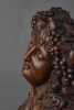 Wood carved bust of Bacchante