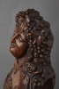 A French walnut carved bust of Bacchante, circa 1830
