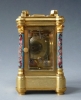 A French miniature carriage clock with two Sèvres portraits, circa 1880.