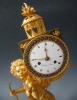 A fine gilt bronze sculptural mantel clock ‘The Magic Lantern’, by Baudoin à Paris, c. 1800.