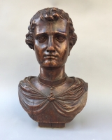 Wooden bust of a young man