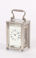 An attractive miniature French nickel plated carriage timepiece circa 1925