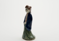 A Figure of an Oriental Lady in Polychrome Dutch Delftware