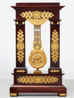 A rare French mahogany and bronze oscillating mantel clock, circa 1830