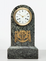 An elegant French green marble arched mantel clock, circa 1830