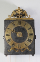 An early French provincial iron and brass Morbier wall clock, circa 1735
