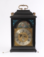 A Dutch ebonised table clock with date, day and moonphase, by J.P. Kroese, circa 1740