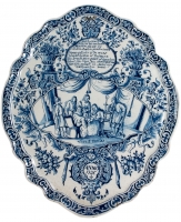 A Dated Oval Plaque in Blue and White Dutch Delftware