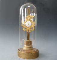 A French rack clock under glass dome on gilded base, Louis Seize, Alsace circa 1780.