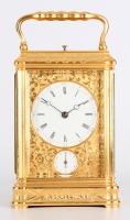 A fine French engraved gilt brass gorge case travel clock with alarm by Drocourt, circa 1880.