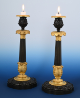 A pair of  ormolu bronze  candle sticks