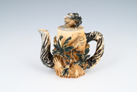 A Chinese mammoth ivory teapot.