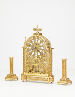 An unusual French Louis XVI filigree skeleton clock set, circa 1780