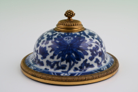 A decorative inkwell