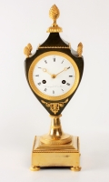 A fine French Empire ormolu and bronze urn mantel clock by Armingaud L.né à Paris, circa 1800