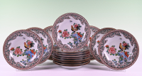 A set of fifteen porcelain plates with cockerel decor