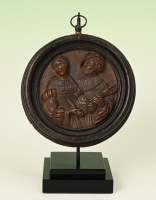 Medallion portrait of man and woman