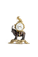This is a very nice and highly decorative 19th-century mantel clock featuring an elephant carrying the clock on its back