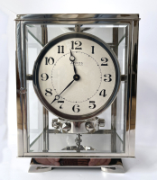 Een nikkelen Atmos klok, Reutter, no 8858 Frankrijk ca.1930.