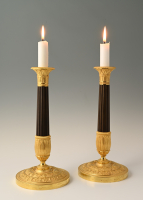 A pair of  ormolu bronze Empire candlesticks