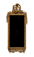 A Carved and Gilded Limewood Mirror