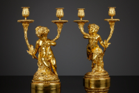 Pair of French Louis XVI candelabra, after Clodion