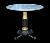 A French Empire patinated bronze and ormolu gueridon