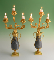 A pair of Louise Seize candelabras