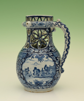 A delftware puzzle jug