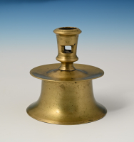 A bronze candlestick