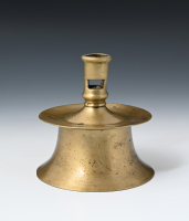 A bronze candlestick