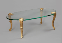 A gilt bronze and glass coffee table – Signed P.E. Guerin New York