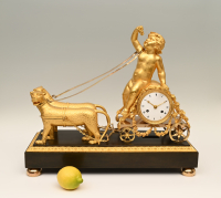 A very rare Empire mantle clock