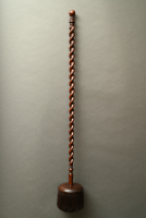 A 17th century brush with round head and twisted handle