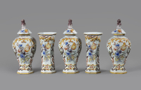 A Dutch Delft polychrome five-piece vase garniture decorated with Dutch tulips