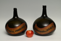 A set of green glass liqueur bottles