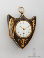 A rare and small French Empire bronze cartel wall clock, circa 1810.