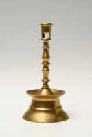 A Dutch bronze candlestick