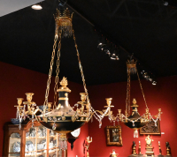 A rare near pair of Russian Empire discus chandeliers