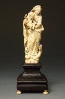 Virgin and Child beating the evil