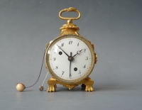 A Swiss Louis XVI- gilt brass miniature  'pendule d'officier'  with alarm, circa 1800.