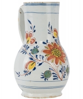 A Polychrome Decorated Jug In Dutch Delftware