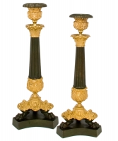 A Pair of Charles X Candlesticks in Ormulu and Patinated Bronze