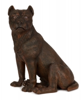 Een Terracotta Sculptuur van een Zittende Hond