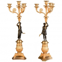 A good pair of four light empire candle sticks, circa 1820