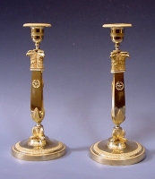 A pair exclusive Russian Empire candlesticks met eagle-heads, circa 1810