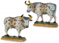 A Pair of Standing Cows in Polychrome Dutch Delftware