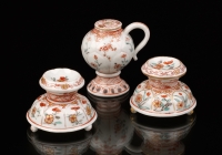 Two Dutch decorated Porcelain Saltcellars and a Mustard Pot, Japan